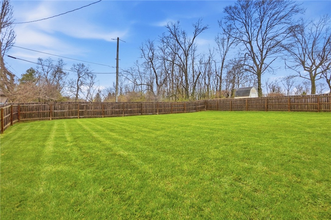 1628 Yorkshire Court Springfield, OH 45503 - Photo 46 of 47 Expansive green space offers privacy and potential for outdoor enjoyment.