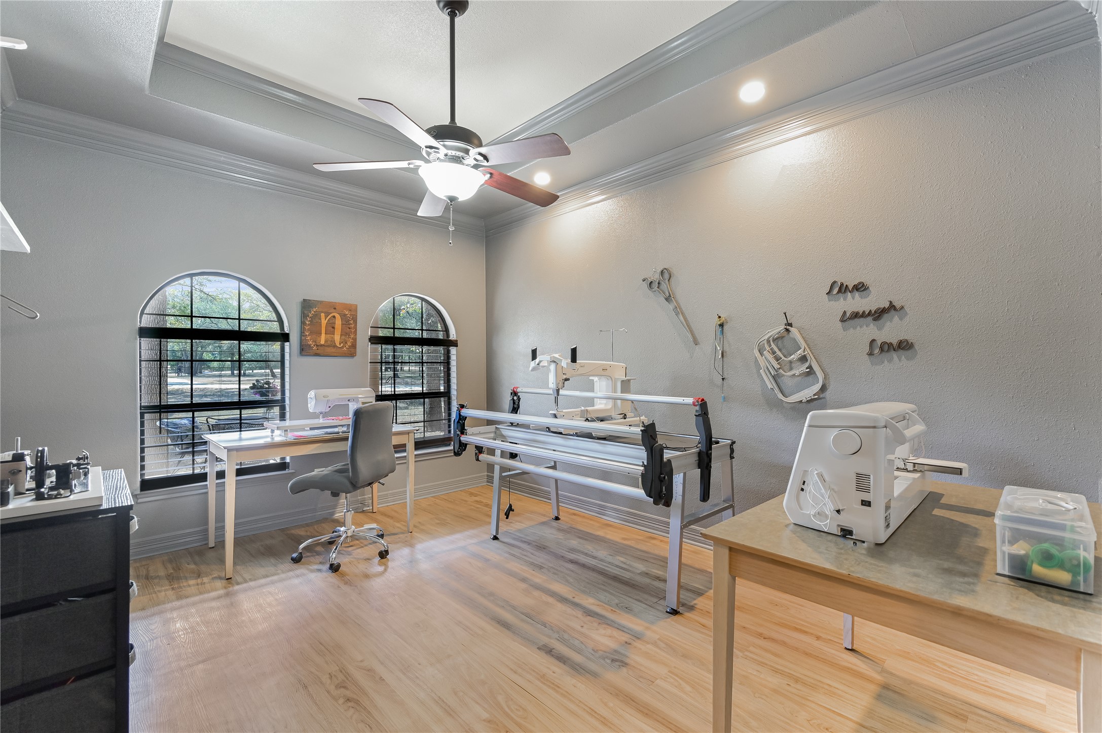 486 Westwood Road Lockhart, TX 78644 - Photo 18 of 29 Office space featuring light wood-type flooring, crown molding, ceiling fan, and a gray walls