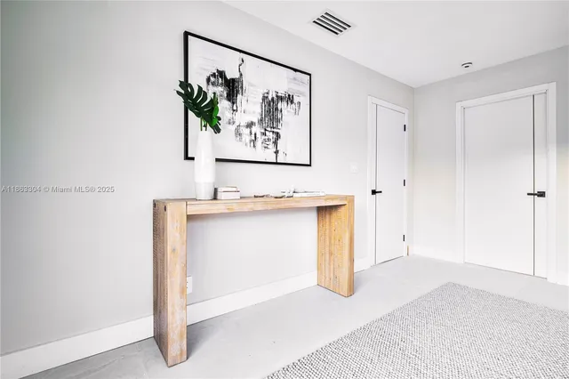 a view of a hallway with elevator