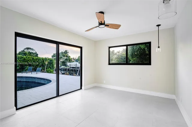 a view of a room with a large window