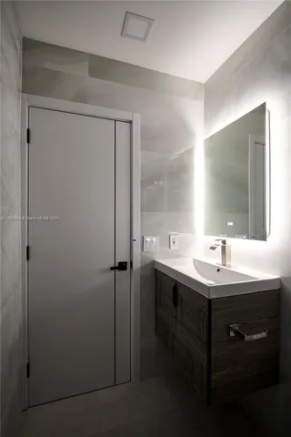 a view of a house with swimming pool and sitting area