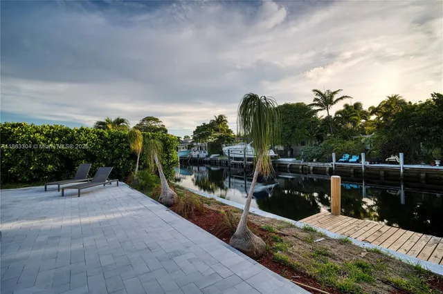 a view of a balcony with chairs