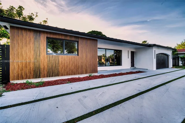 a view of a house with a street