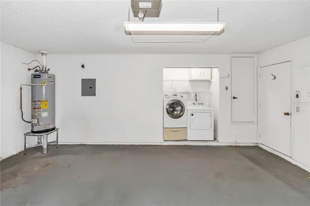 a view of a storage & utility room with a window