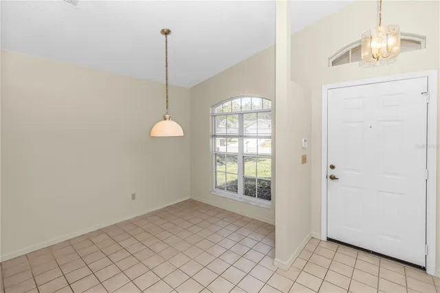 a view of an empty room and window