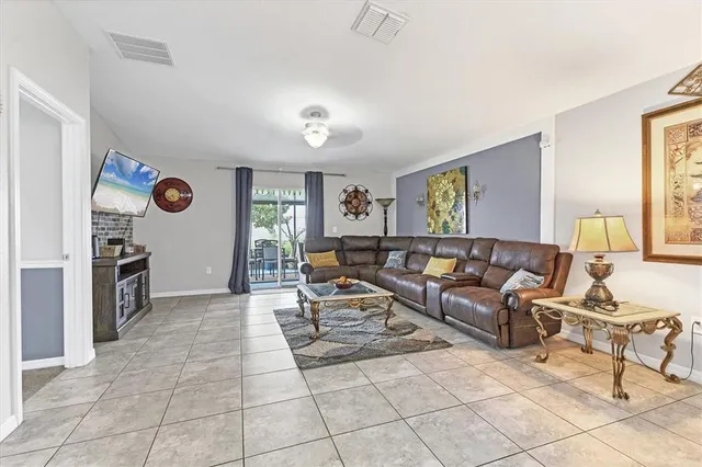 a living room with furniture and window