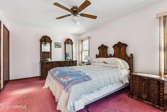a bathroom with a granite countertop shower and a sink