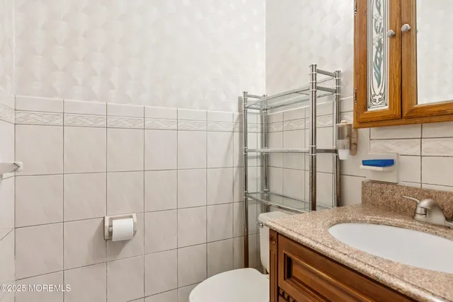 a work room with furniture and gym equipment