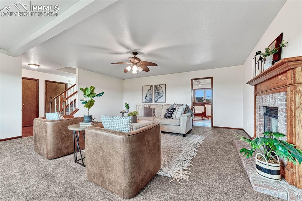 12220 Old Barn Road Elbert, CO 80106 - Photo 23 of 47 a living room with furniture