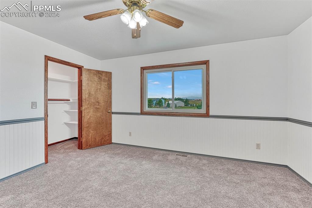 12220 Old Barn Road Elbert, CO 80106 - Photo 34 of 47 a view of an empty room with a window