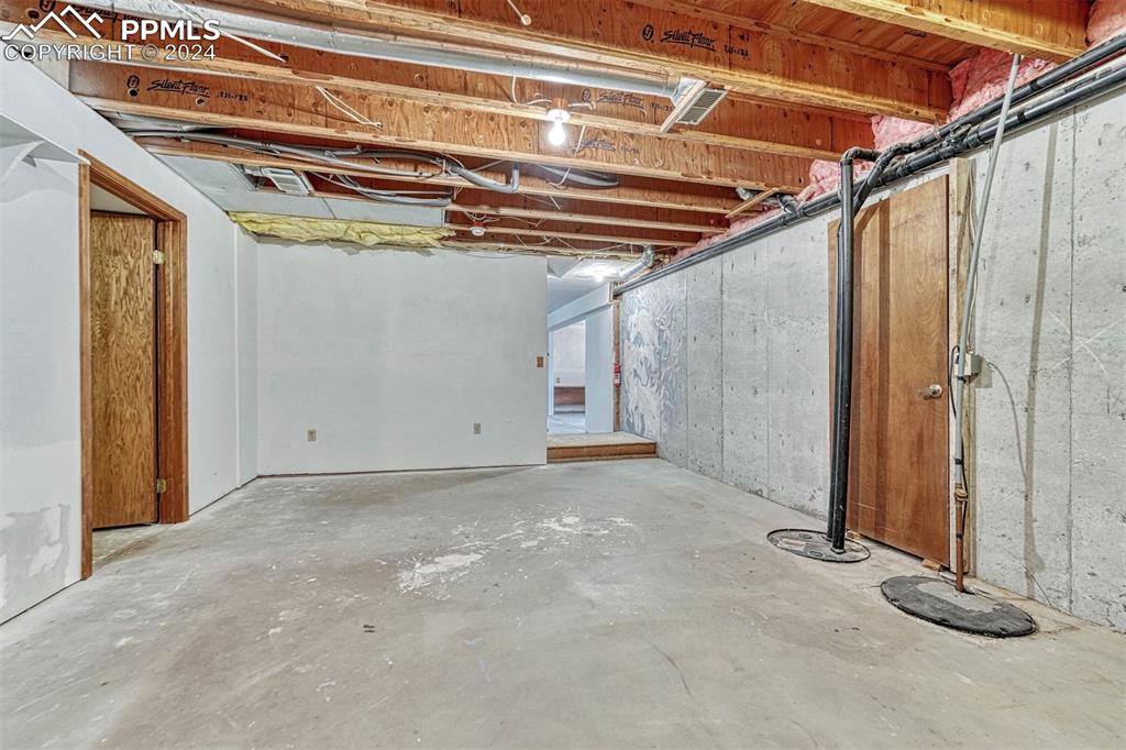 12220 Old Barn Road Elbert, CO 80106 - Photo 40 of 47 a view of a room with wooden walls