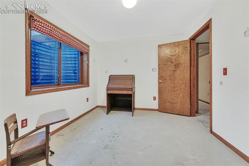 12220 Old Barn Road Elbert, CO 80106 - Photo 41 of 47 a view of an empty room with a window