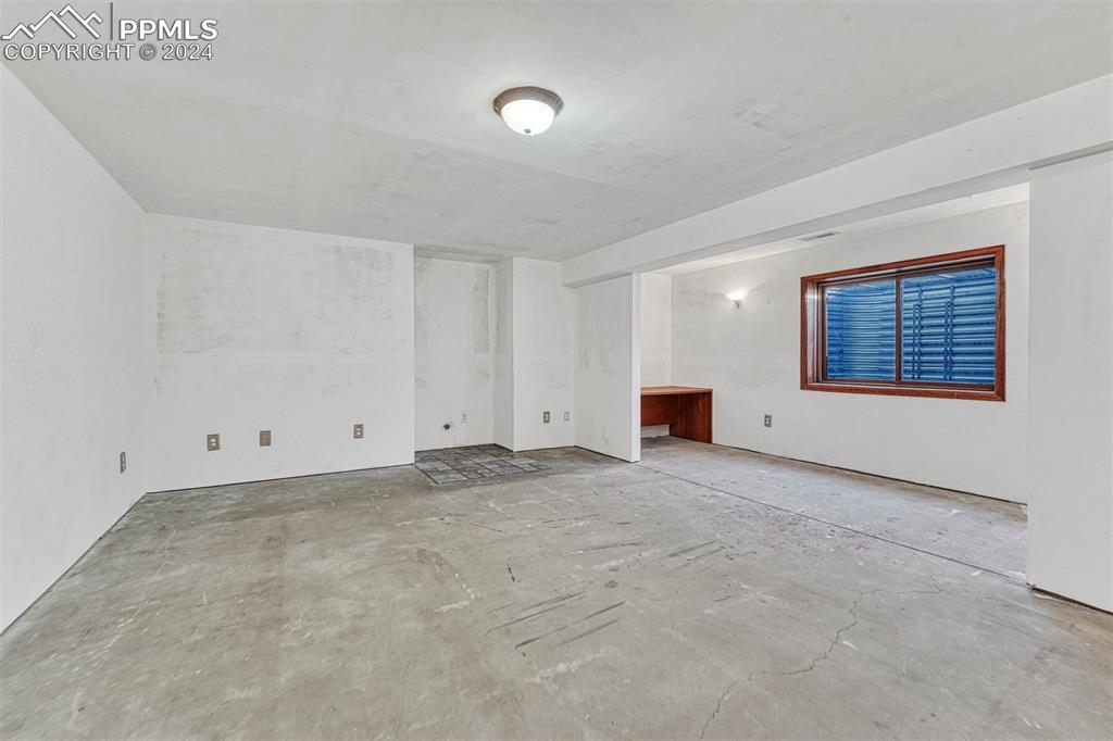 12220 Old Barn Road Elbert, CO 80106 - Photo 44 of 47 a view of an empty room with a window