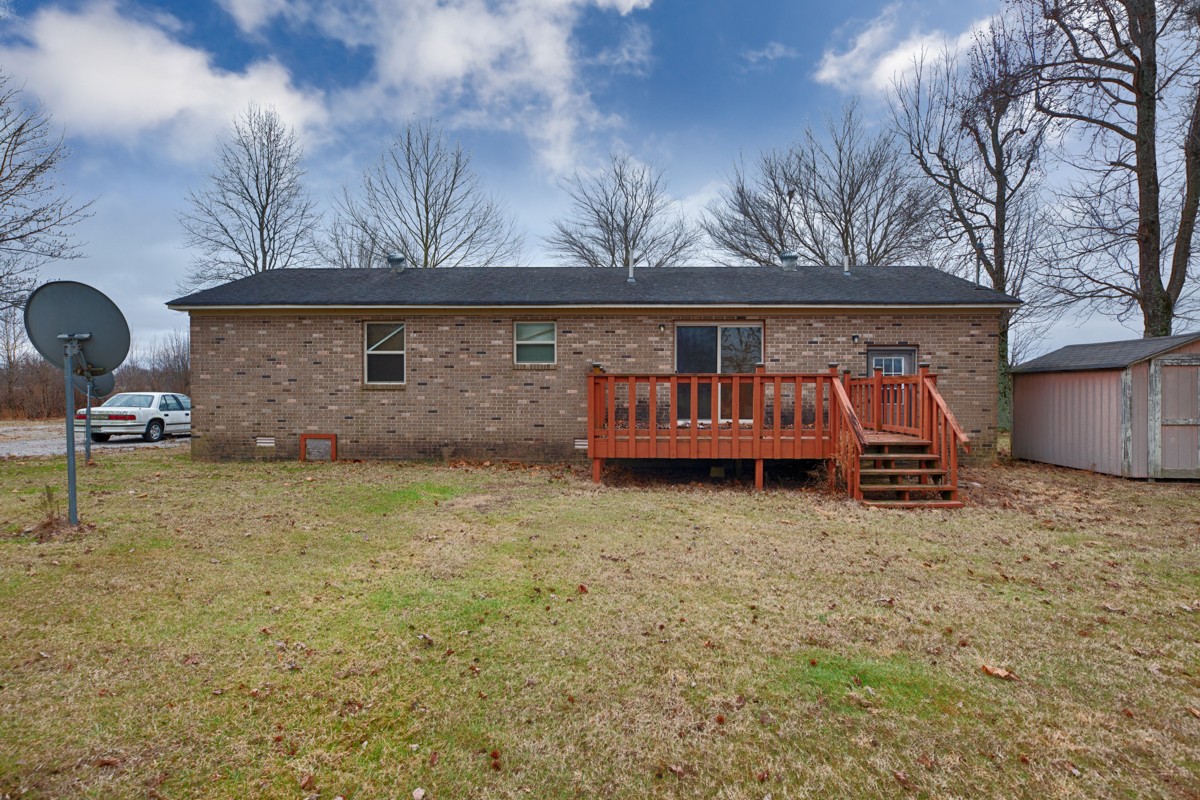 236 Old Baptist Road Ardmore, TN 38449 - Photo 2 of 15 a view of backyard with wooden fence