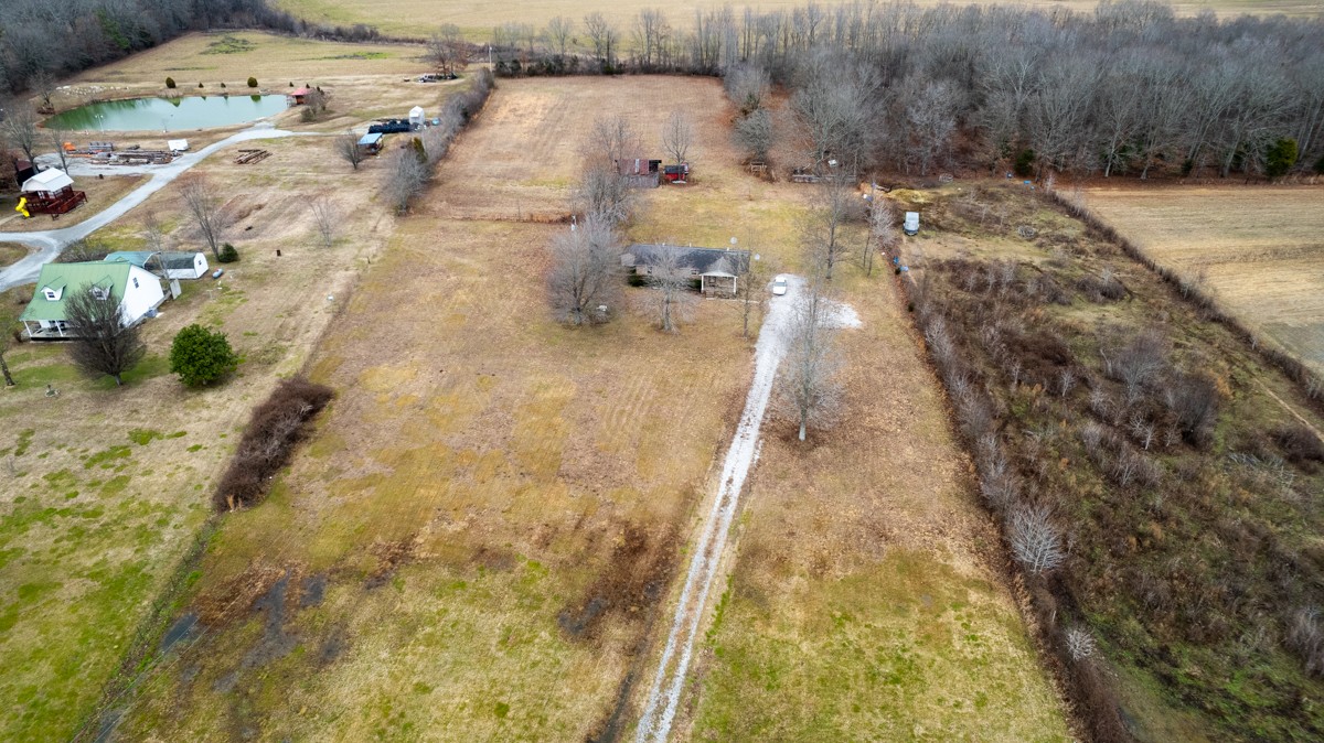 236 Old Baptist Road Ardmore, TN 38449 - Photo 3 of 15 a view of a swimming pool with a yard
