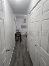 a bathroom with a shower and a sink