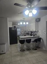 a bathroom with a double vanity sink and mirror