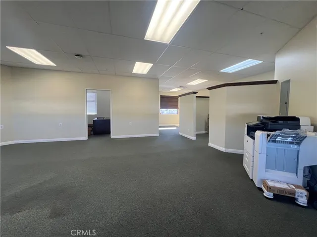 a view of a livingroom with furniture