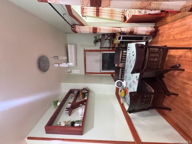 91-33 78th Street Queens, NY 11421 - Photo 13 of 26 a view of a workspace with furniture