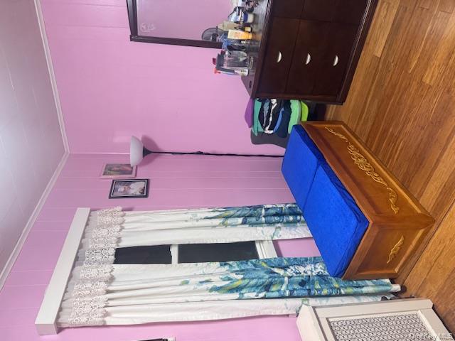 91-33 78th Street Queens, NY 11421 - Photo 16 of 26 a room with furniture and mirror