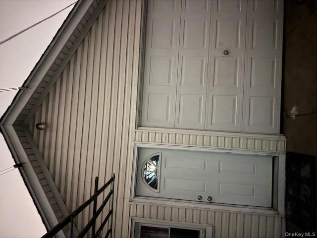 91-33 78th Street Queens, NY 11421 - Photo 24 of 26 a front view of a house