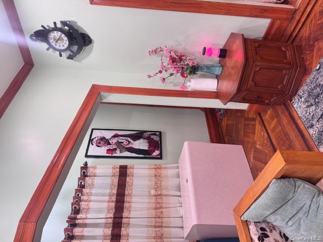 91-33 78th Street Queens, NY 11421 - Photo 7 of 26 a living room with furniture and a potted plant