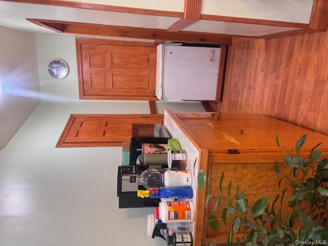 91-33 78th Street Queens, NY 11421 - Photo 9 of 26 a room with storage and utility