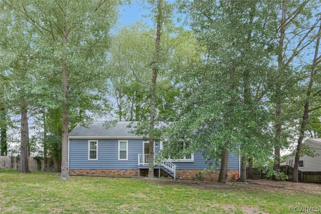 front view of a house with a yard