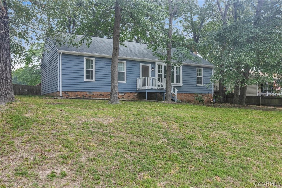 16127 Sandwave Road Chester, VA 23831 - Photo 3 of 26 a backyard of a house