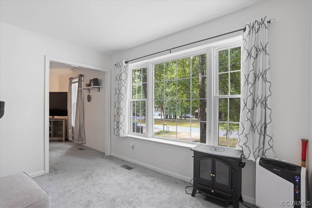 16127 Sandwave Road Chester, VA 23831 - Photo 6 of 26 a view of livingroom with furniture and window