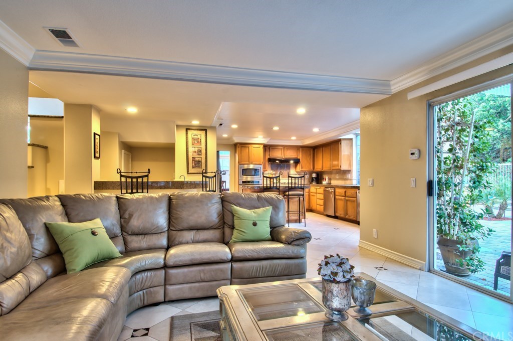 4224 San Ramon Drive Corona, CA 92882 - Photo 13 of 63 Photo of the kitchen and family room area. The functionality and comfort of this section of the house is boosted by its openness to the spacious family room