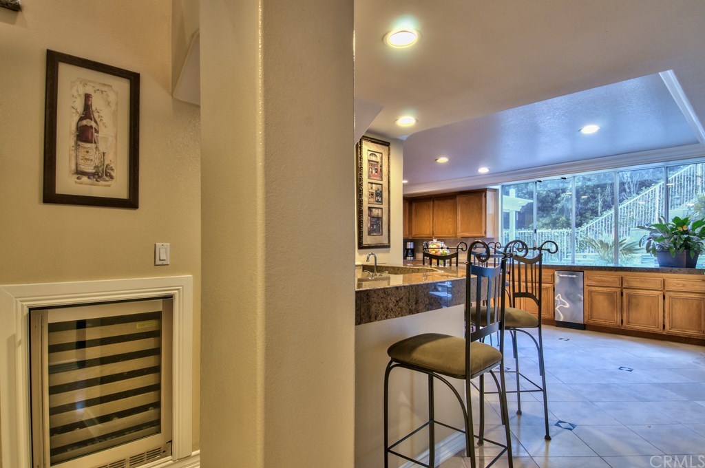 4224 San Ramon Drive Corona, CA 92882 - Photo 16 of 63 Here is another angle of the kitchen from the bar area.
