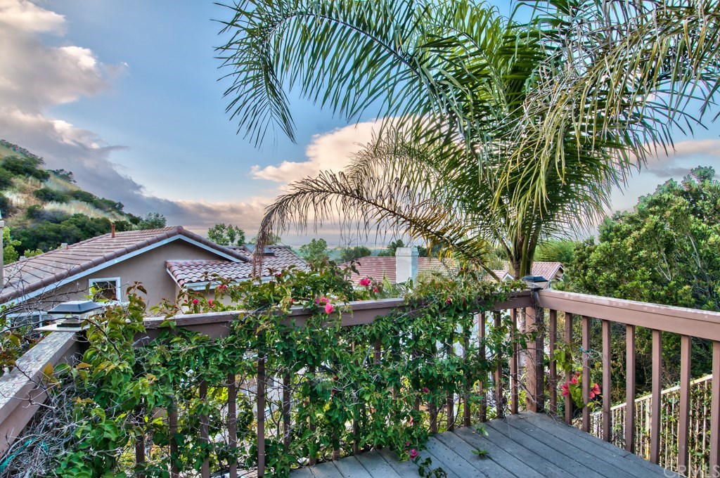 4224 San Ramon Drive Corona, CA 92882 - Photo 18 of 63 Need a quiet and secluded place to relax or meditate? Enjoy the sunsets, mountain and city lights views from this secluded and serene balcony/deck standing alone in the backyard.