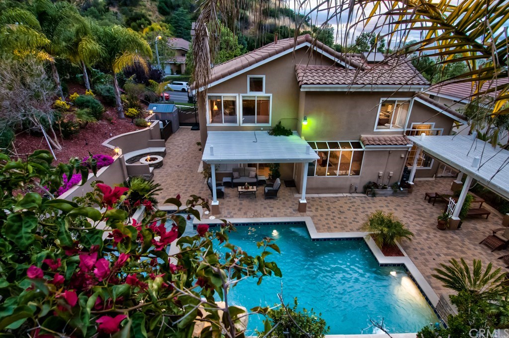 4224 San Ramon Drive Corona, CA 92882 - Photo 20 of 63 This amazing backyard has extensive areas covered with paver stones.