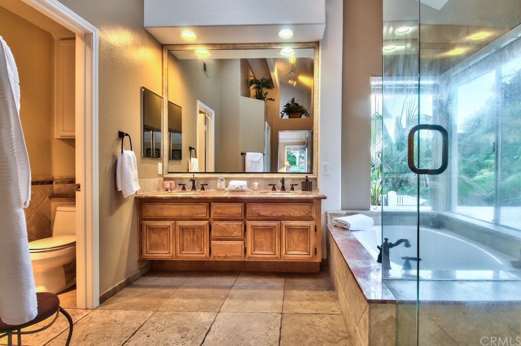 4224 San Ramon Drive Corona, CA 92882 - Photo 29 of 63 The master bath also has Travertine floors.