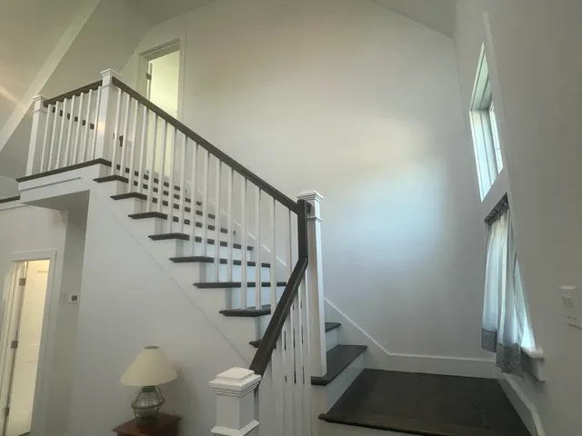a view of entryway with wooden floor