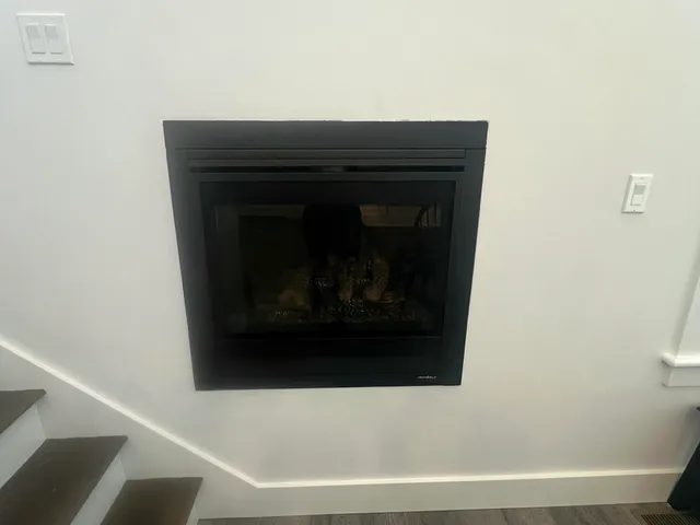 a bathroom with a fireplace