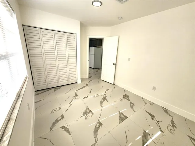 a view of a room with a window