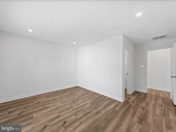 a view of a balcony with sitting area