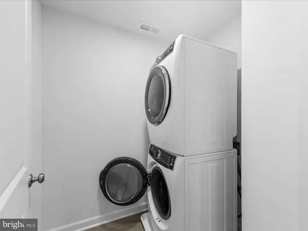 a picture of a bench in front of a window