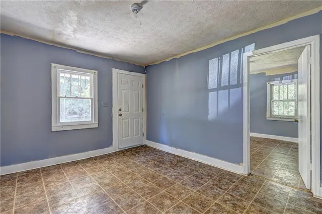 a view of an empty room and window