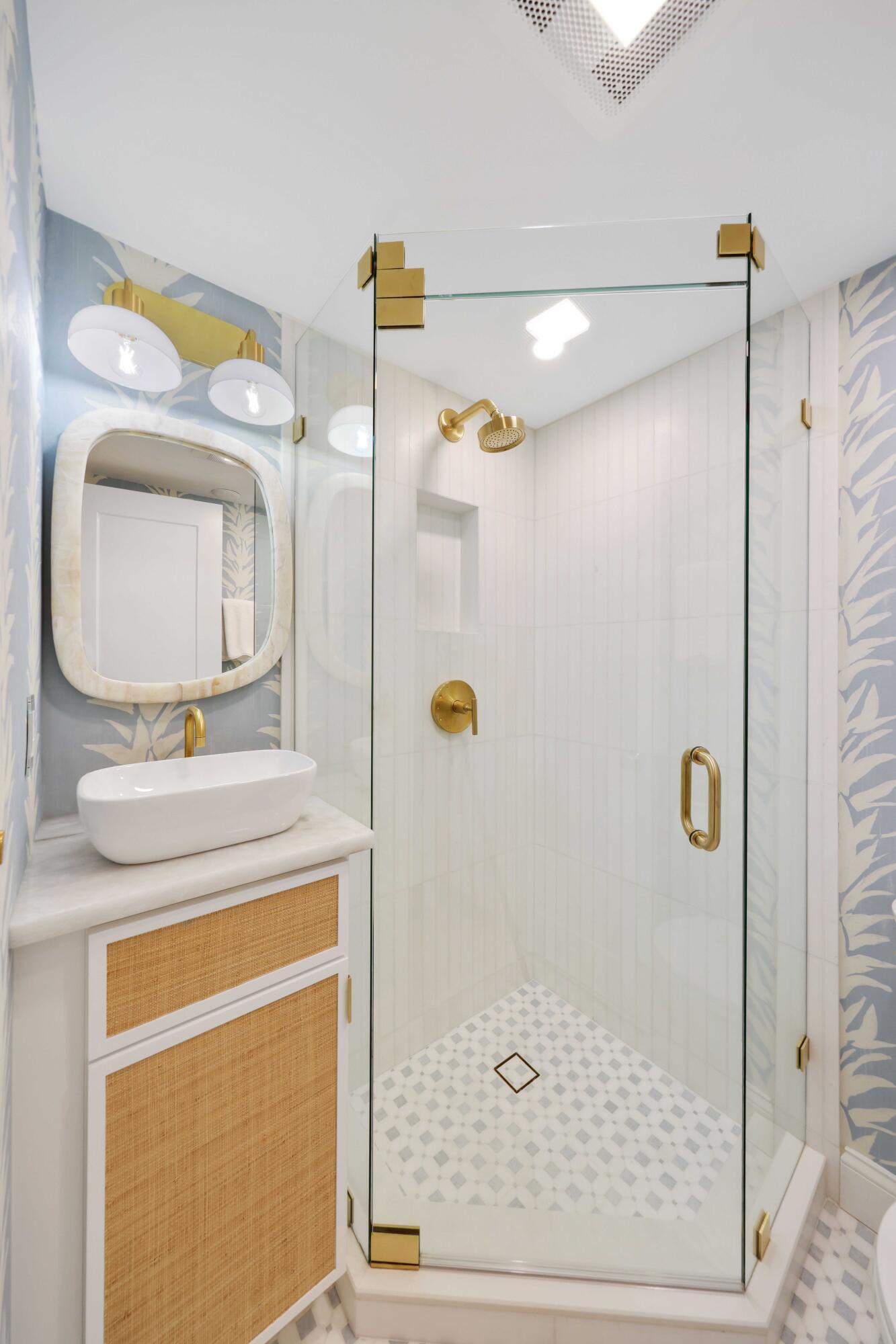 139 Sunrise Avenue, Unit 1040 Palm Beach, FL 33480 - Photo 23 of 43 a bathroom with a granite countertop sink a mirror and a shower