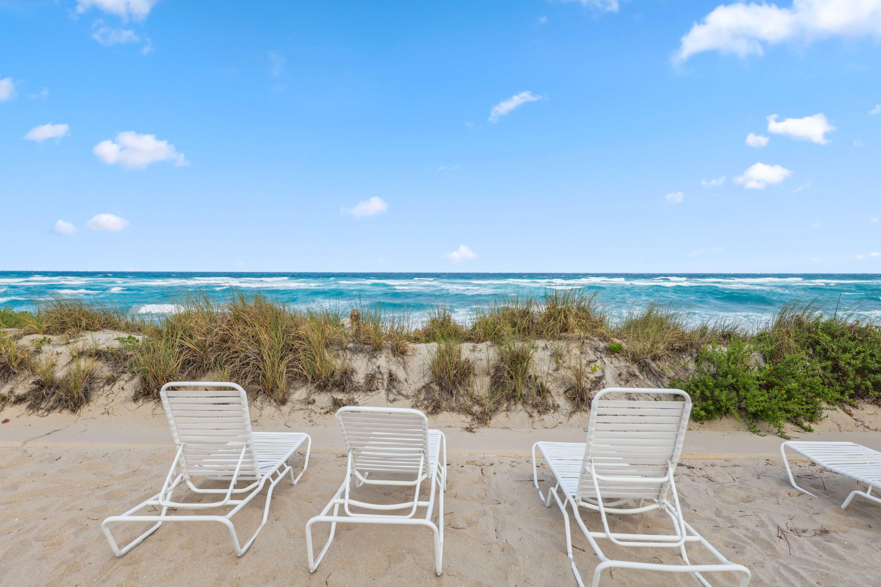 139 Sunrise Avenue, Unit 1040 Palm Beach, FL 33480 - Photo 36 of 43 a view of a chairs and table on the terrace