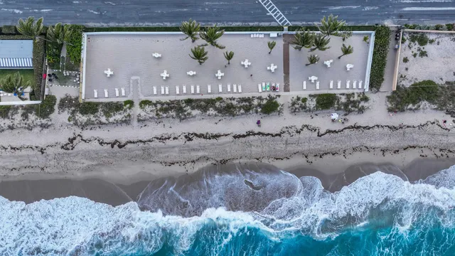 a view of a street with a building in the background