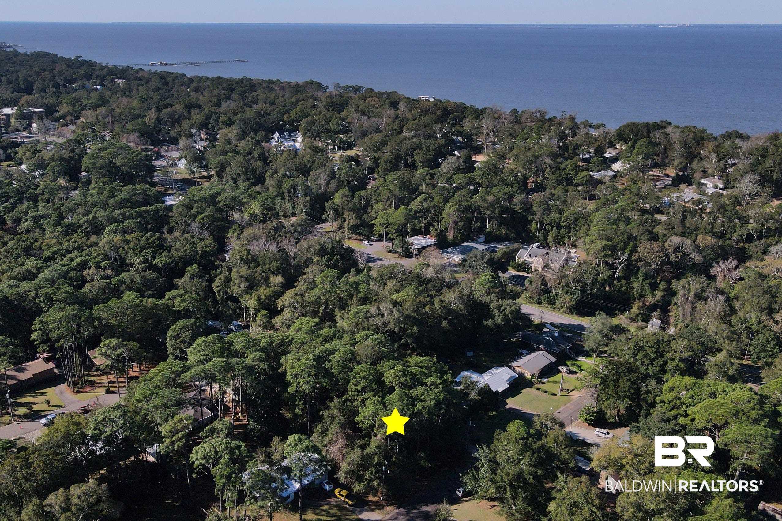 Lot 2 Rosa Avenue Fairhope, AL 36532 - Photo 9 of 10 Aerial overview of property's location with a large body of water and a forest