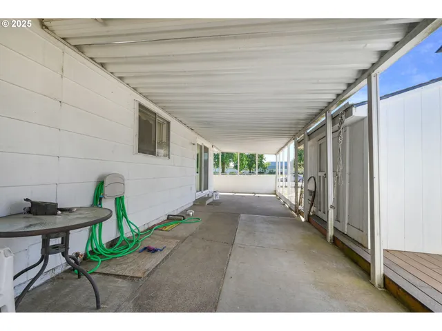 a view of house with a yard