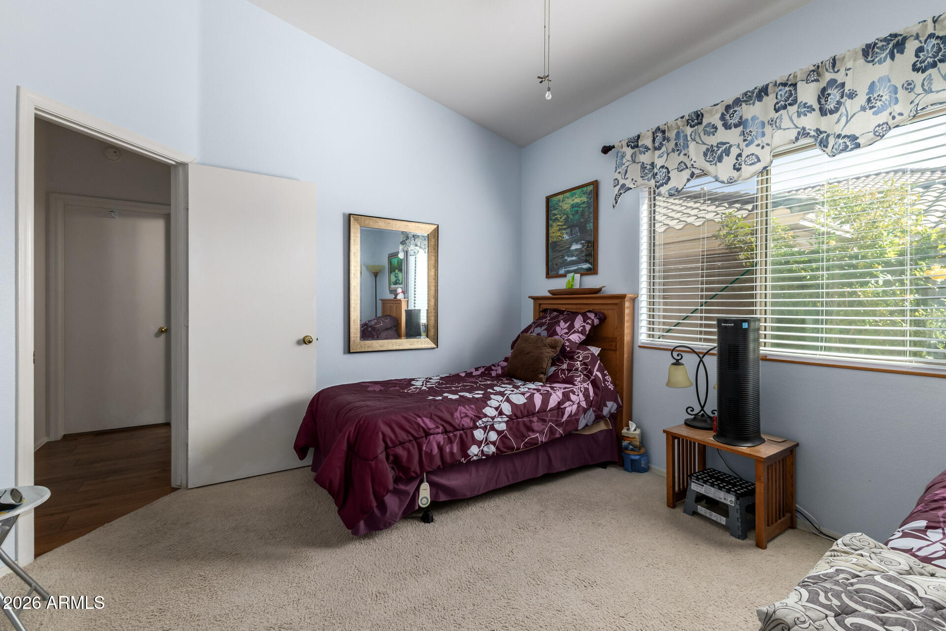 3448 West Webster Court Anthem, AZ 85086 - Photo 18 of 40 a bedroom with bed and a window