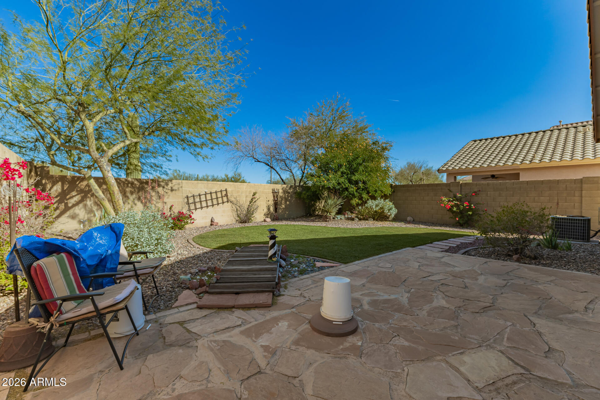 3448 West Webster Court Anthem, AZ 85086 - Photo 20 of 40 a view of a chairs and table in the patio