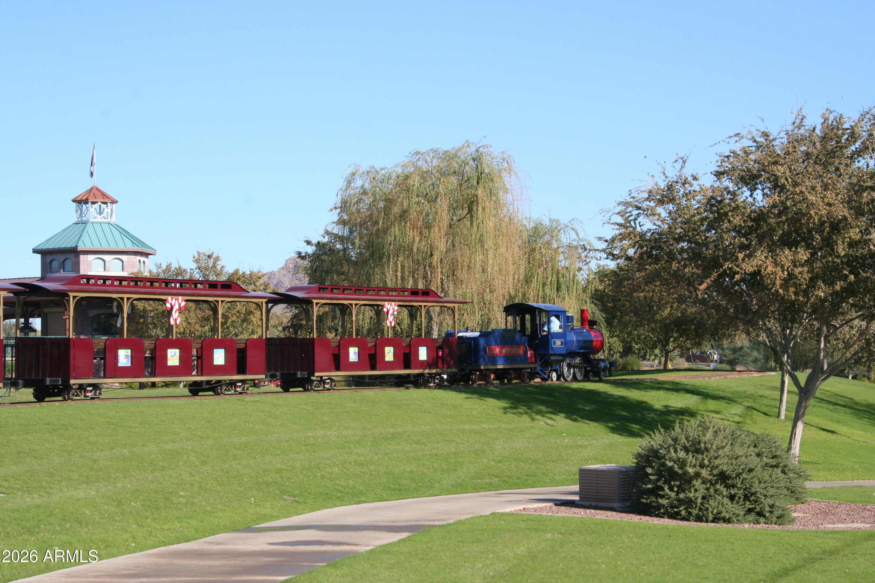 3448 West Webster Court Anthem, AZ 85086 - Photo 30 of 40 a front view of a house with garden