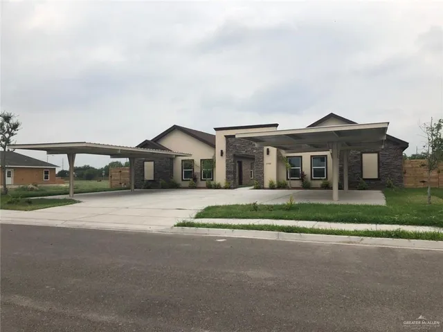 front view of a house with a street